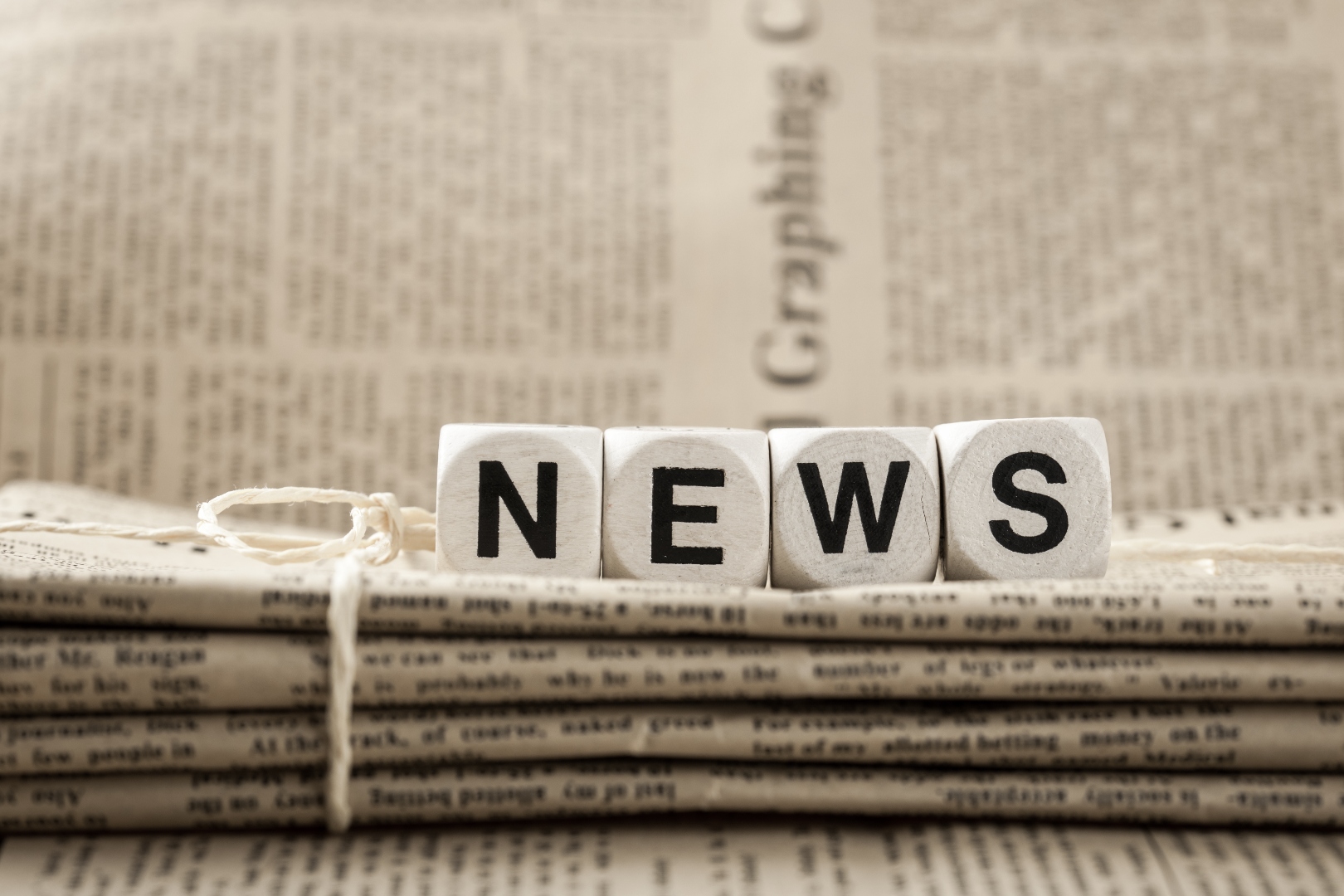 Media Relations — newspaper blocks spelling NEWS